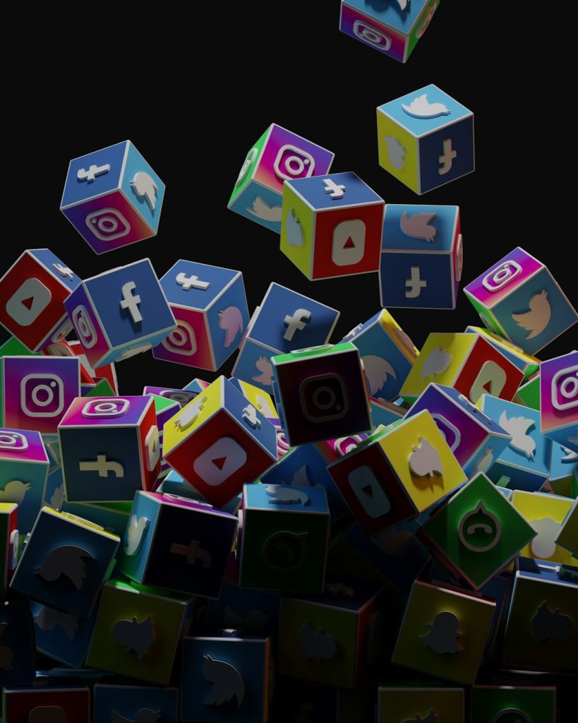 a-pile-of-colorful-cubes-with-social-icons-flying-out-of-them-nmz3sdzsyio a-pile-of-colorful-cubes-with-social-icons-flying-out-of-them-nmz3sdzsyio